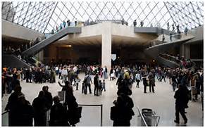 Descending into the Louvre